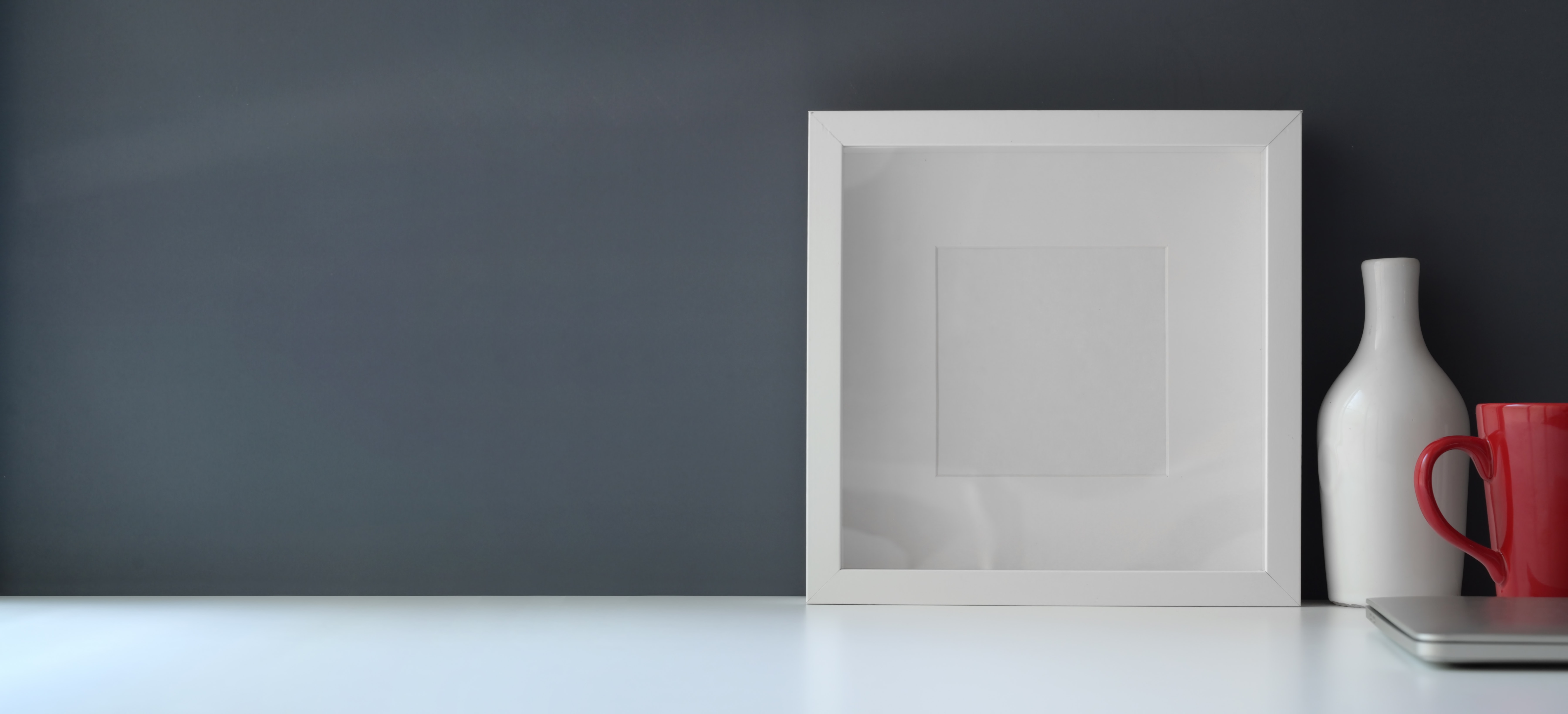 white-wooden-frame-on-white-flat-board-3774047